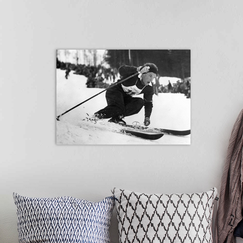 A bohemian room featuring Othmar Schneider of Austria in action on his way to winning the Slalom at the 1952 Oslo Winter Ol...