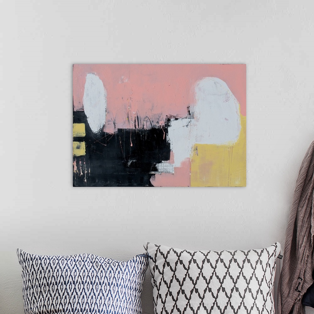 A bohemian room featuring Horizontal abstract painting with a pale pink background and white, yellow, and black on top.