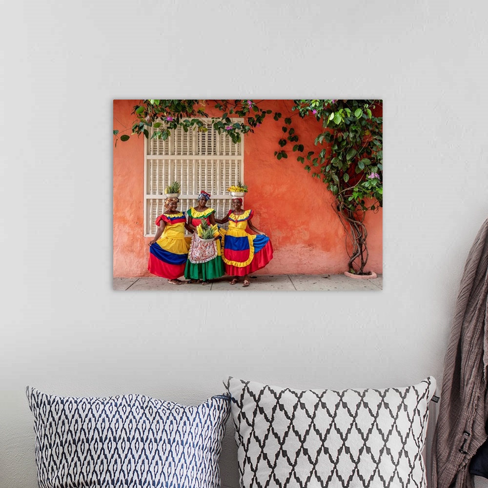 A bohemian room featuring Colourful Palenqueras selling fruits on the street of Cartagena, Bolivar Department, Colombia (MR).