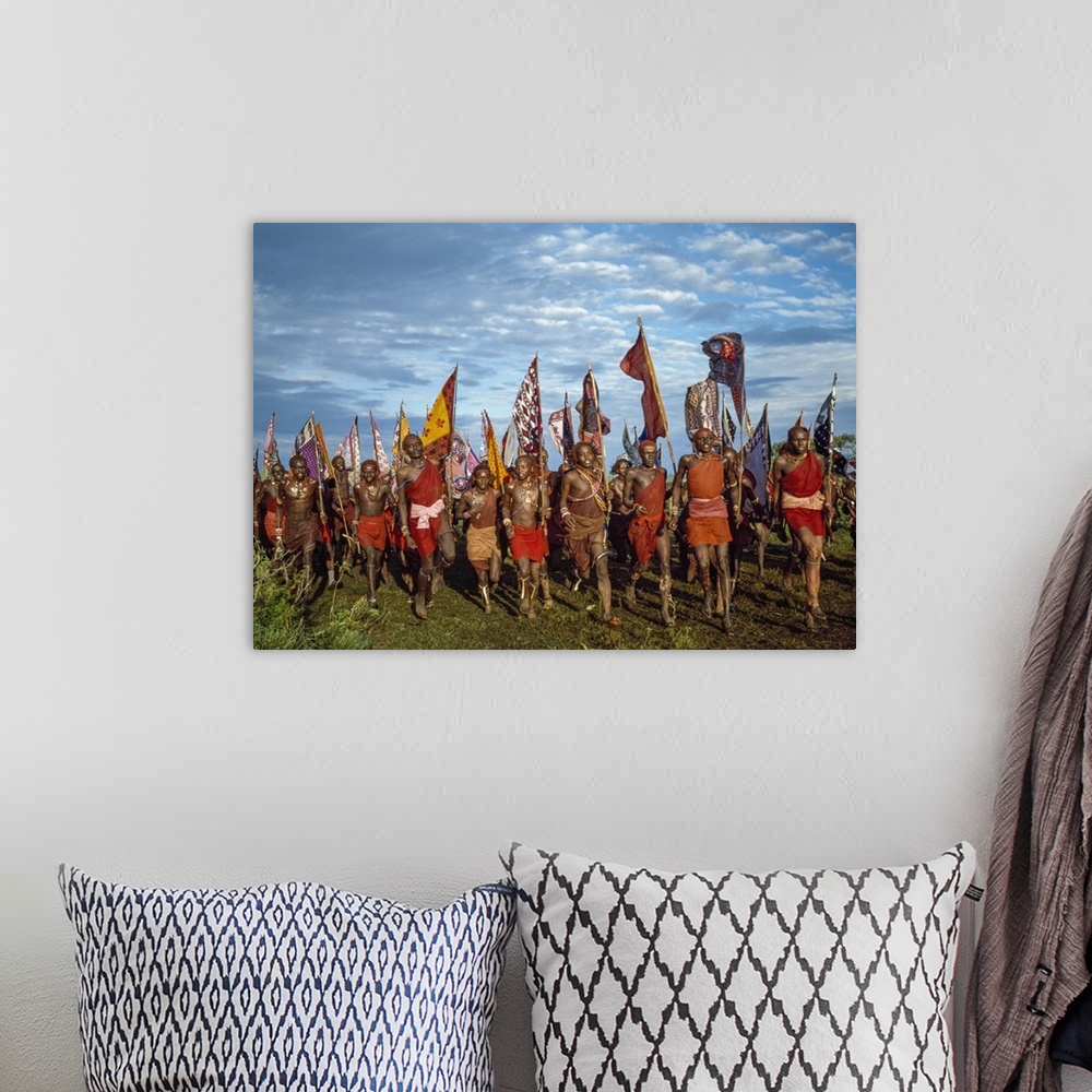A bohemian room featuring Kenya, Kilgoris County, Oloololo. Maasai warriors dance during an eunoto ceremony.