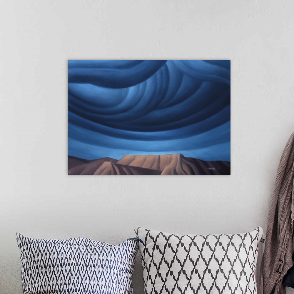 A bohemian room featuring Skyscape painting of a mesa with swirling cobalt sky.