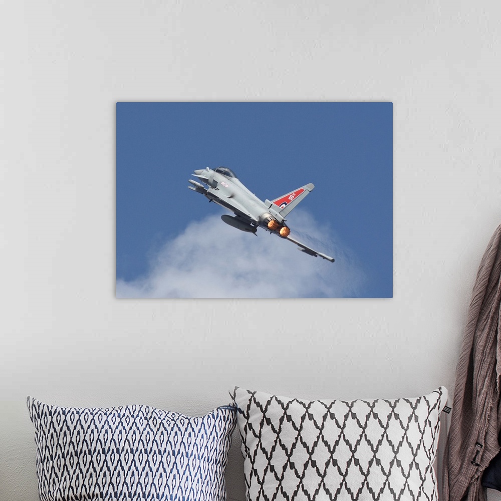A bohemian room featuring Royal Air Force Typhoon FGR4 taking off.