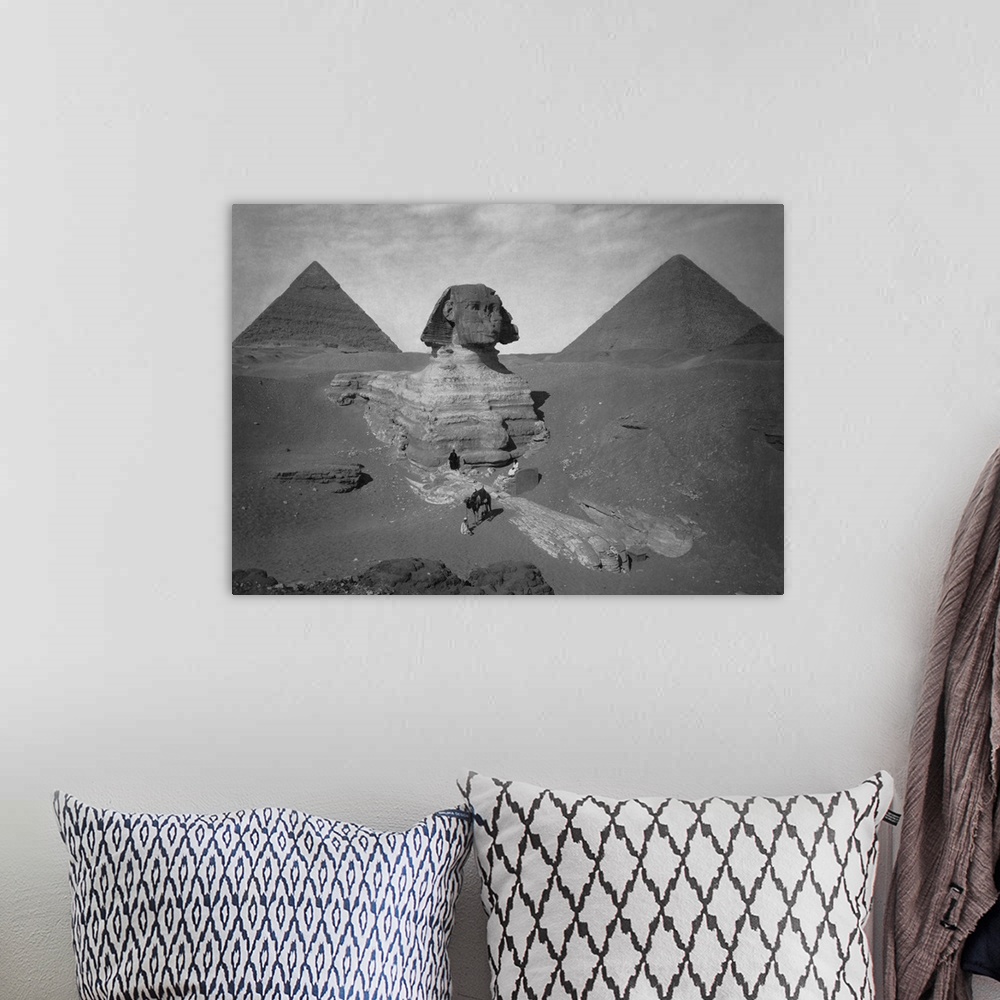 A bohemian room featuring Vintage Egyptian history photo of the partially excavated Sphinx of Giza.