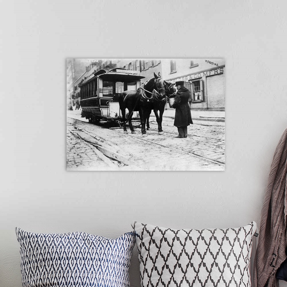 A bohemian room featuring A horse-drawn Chambers Street Ferry streetcar in downtown Manhattan, New York City. Photograph, c...