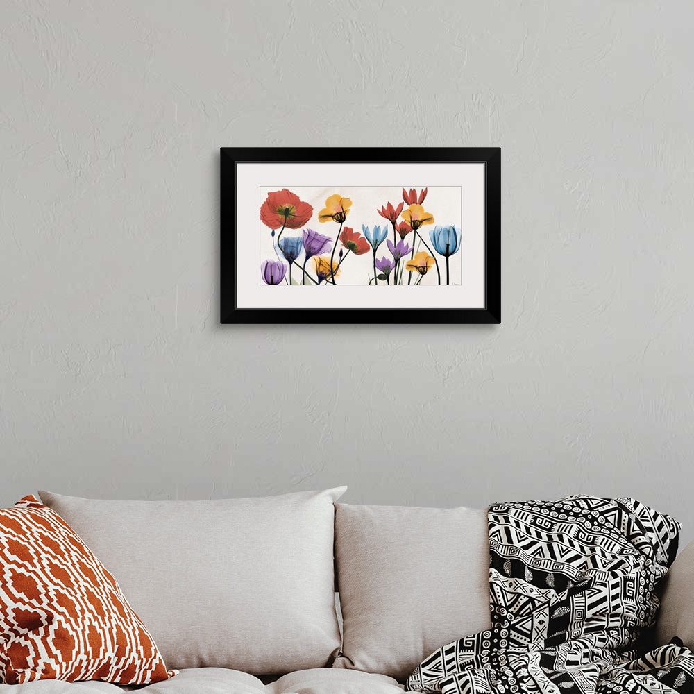 A bohemian room featuring X-ray photograph of spring time colorful flowers.