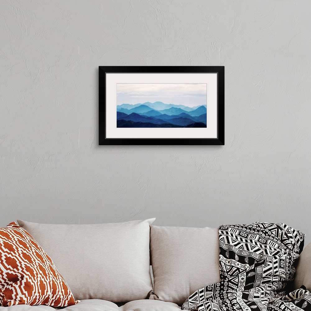 A bohemian room featuring Landscape image of the Blue Ridge mountains.