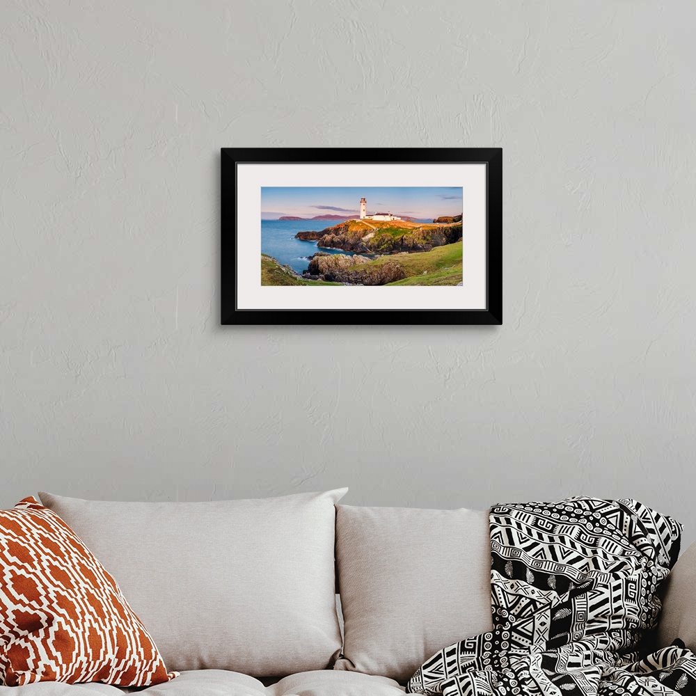 A bohemian room featuring Fanad Head (Fanaid) lighthouse, County Donegal, Ulster region, Ireland, Europe. Panoramic view of...
