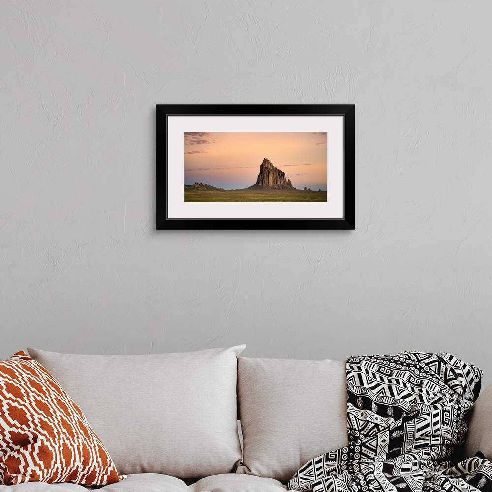 A bohemian room featuring Sunset Over Shiprock, Shiprock