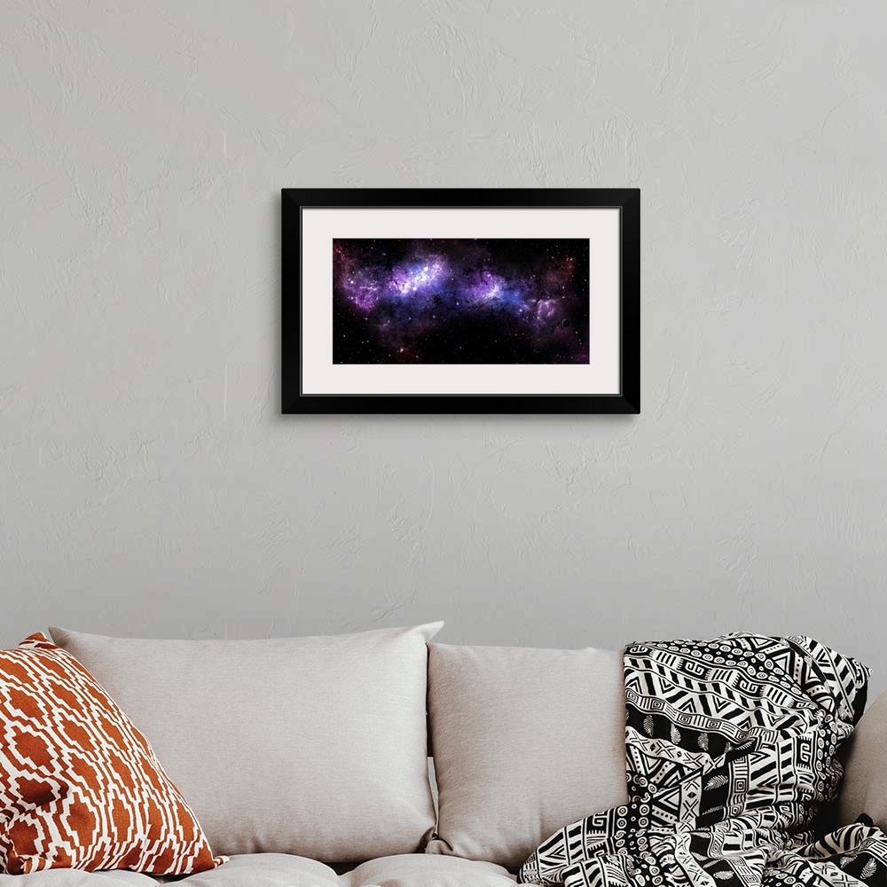 A bohemian room featuring Long horizontal canvas of a nebula in outer space with stars sprinkled throughout.