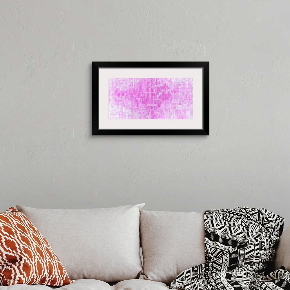 A bohemian room featuring Large abstract art in shades of pink and white with geometric shapes.