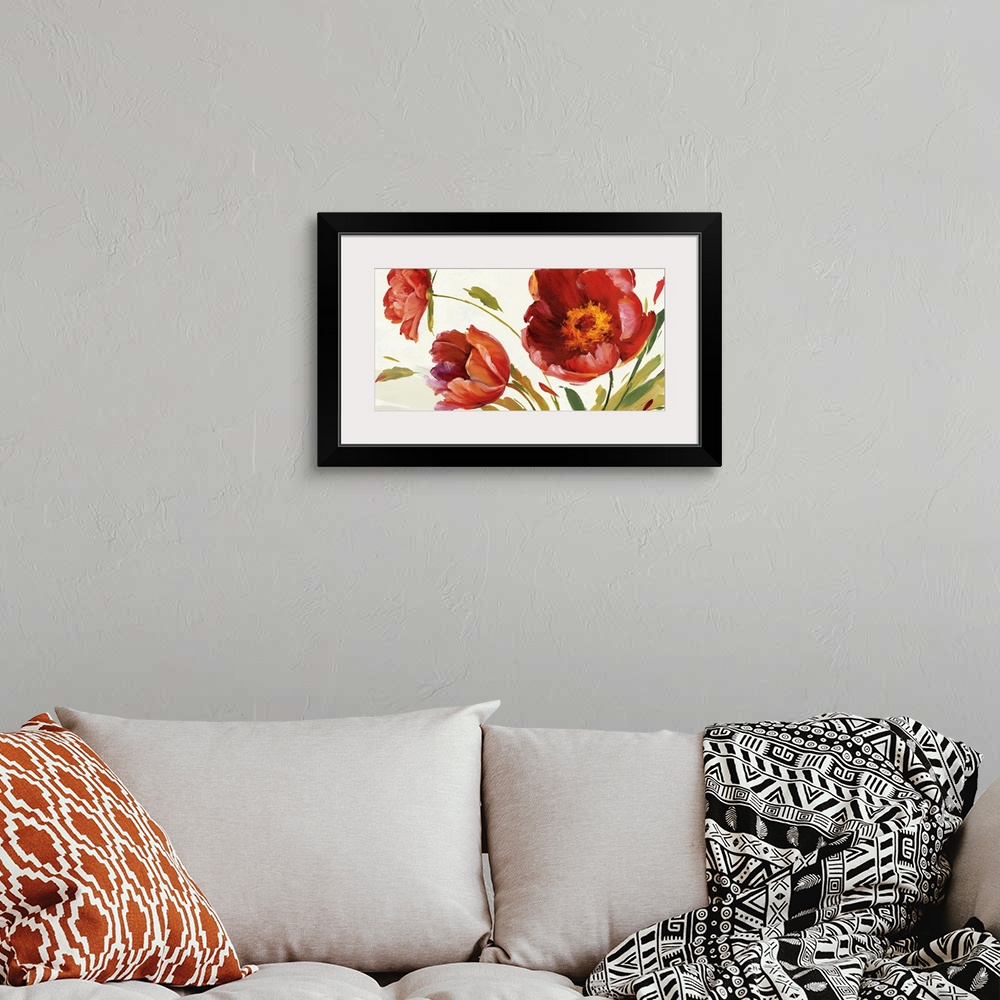 A bohemian room featuring Contemporary art piece of giant red poppy flowers blowing in the invisible wind.