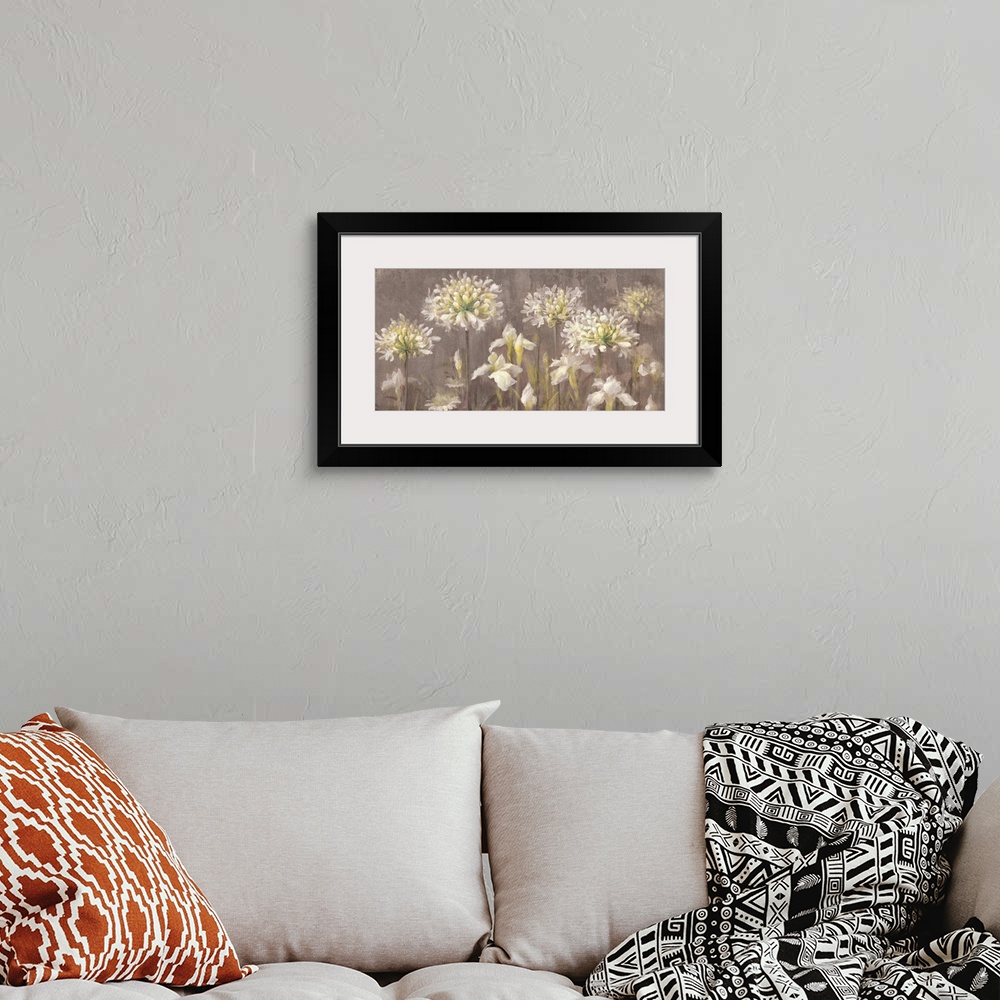A bohemian room featuring Contemporary painting of blooming white flowers in a garden.