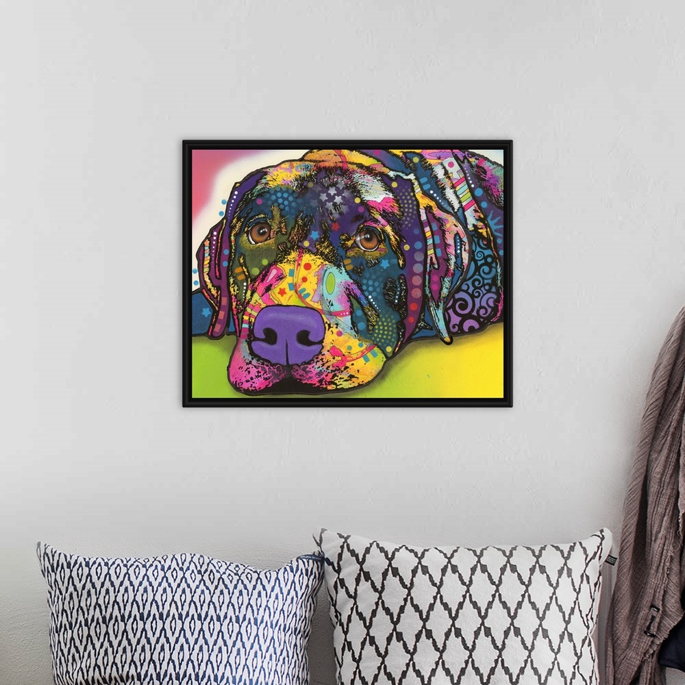 A bohemian room featuring Colorful painting of a Labrador with graffiti-like designs all over.