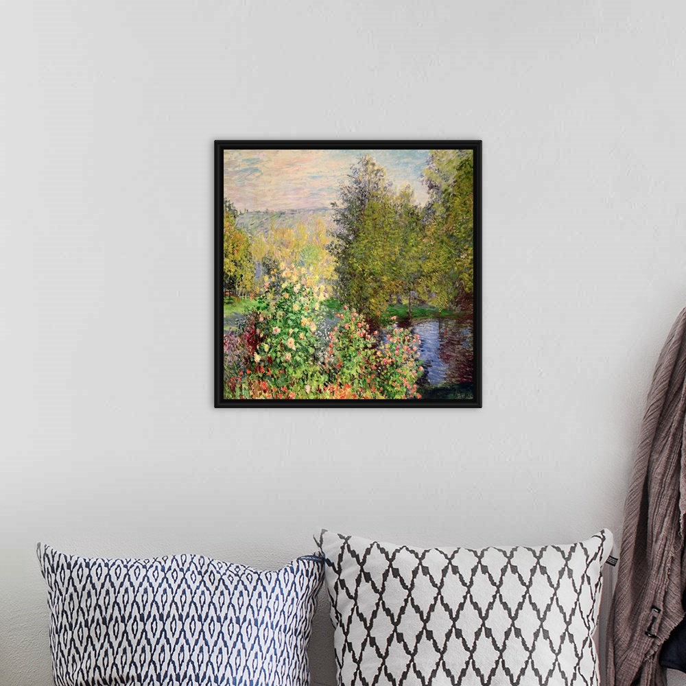 A bohemian room featuring Oil on canvas of a luscious garden with flowers by a river.