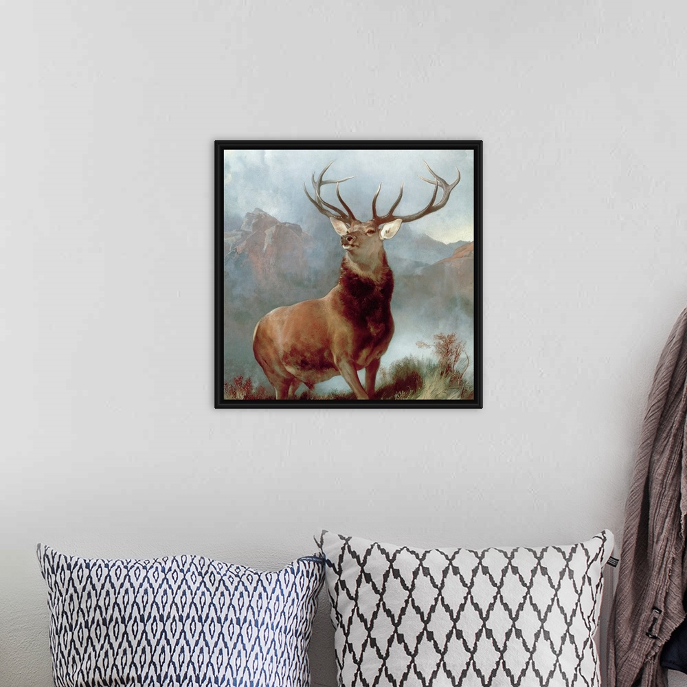 A bohemian room featuring A square, landscape painting of a majestic stag posing in the mountains.