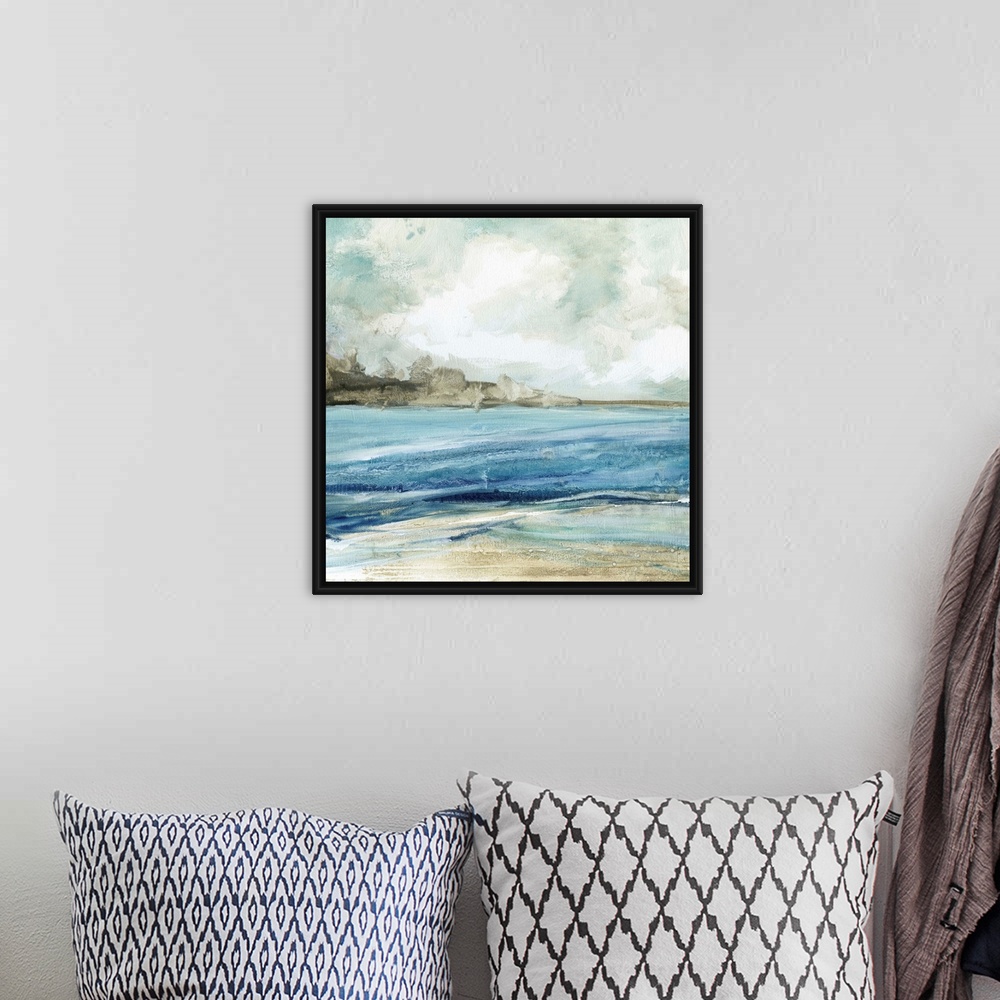 A bohemian room featuring Abstract painting of the beach with layers of blue, gray, and white hues.