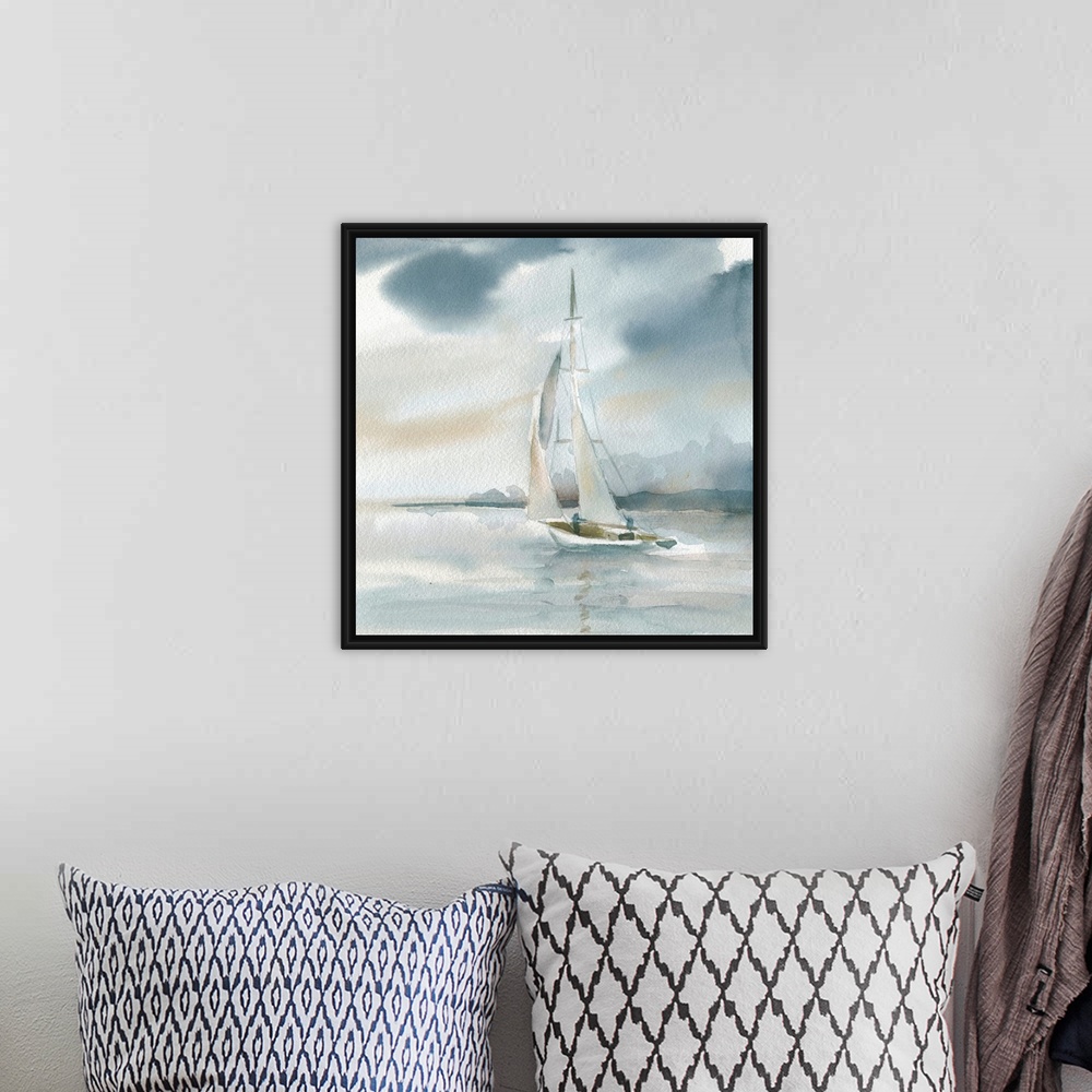 A bohemian room featuring Square watercolor painting of a sailboat on the ocean in shades of blue and beige.