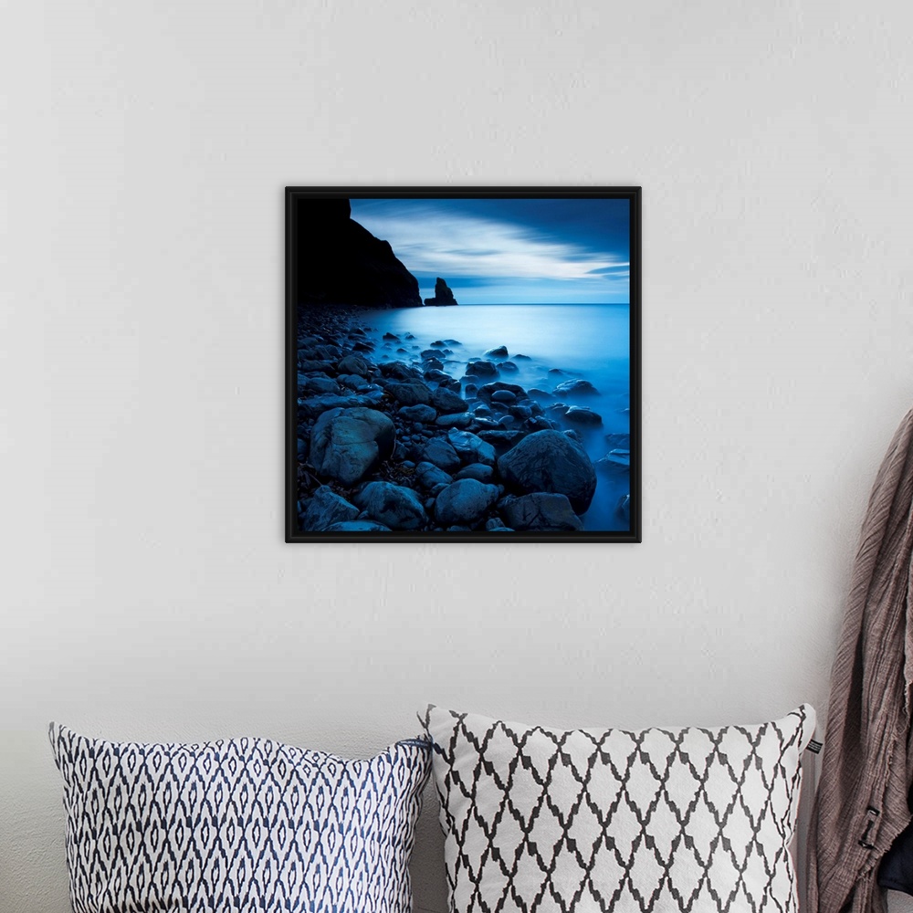 A bohemian room featuring This is a vertical landscape photograph of fog and water on rocky beach that would make great hug...