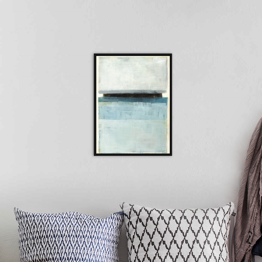 A bohemian room featuring Large abstract painting with rectangular sections of color in shades of blue and gray with one bl...