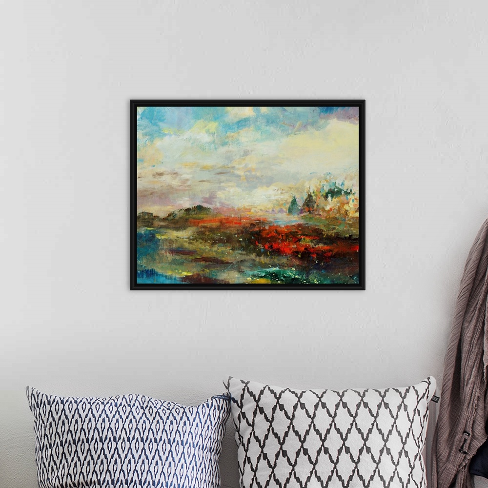 A bohemian room featuring Abstracted landscape painting with a cityscape on the horizon.