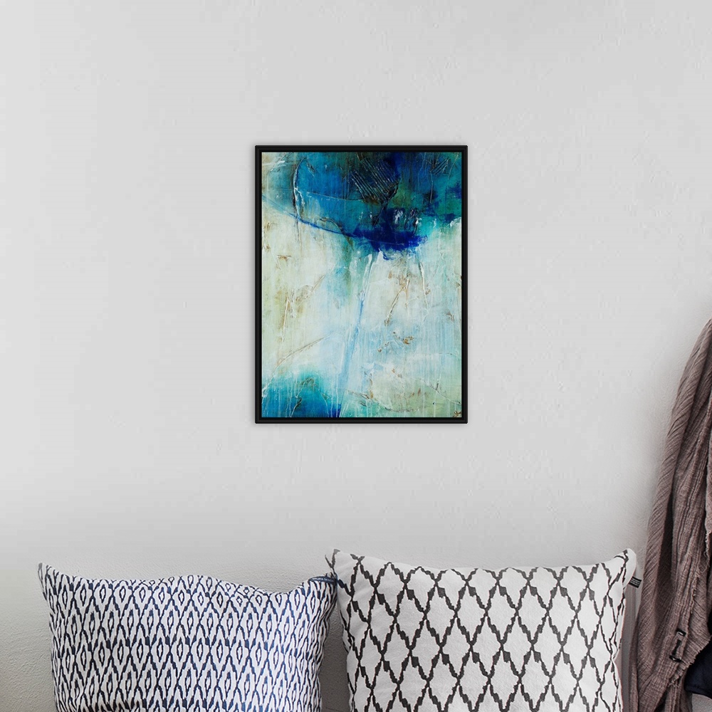 A bohemian room featuring Abstract art of a large mass of cool colors at the top, with a single line of blue that leads dow...