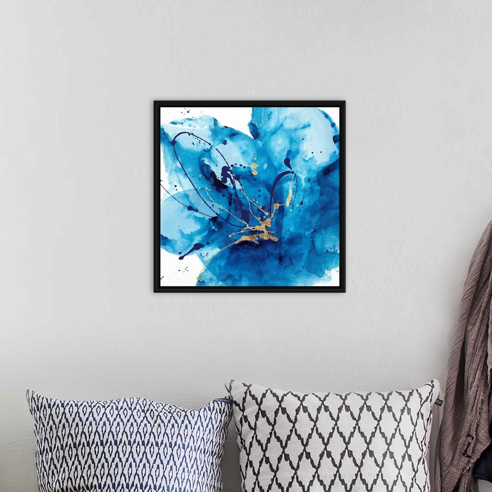 A bohemian room featuring Contemporary abstract painting using a splash of vibrant blue against a white background.