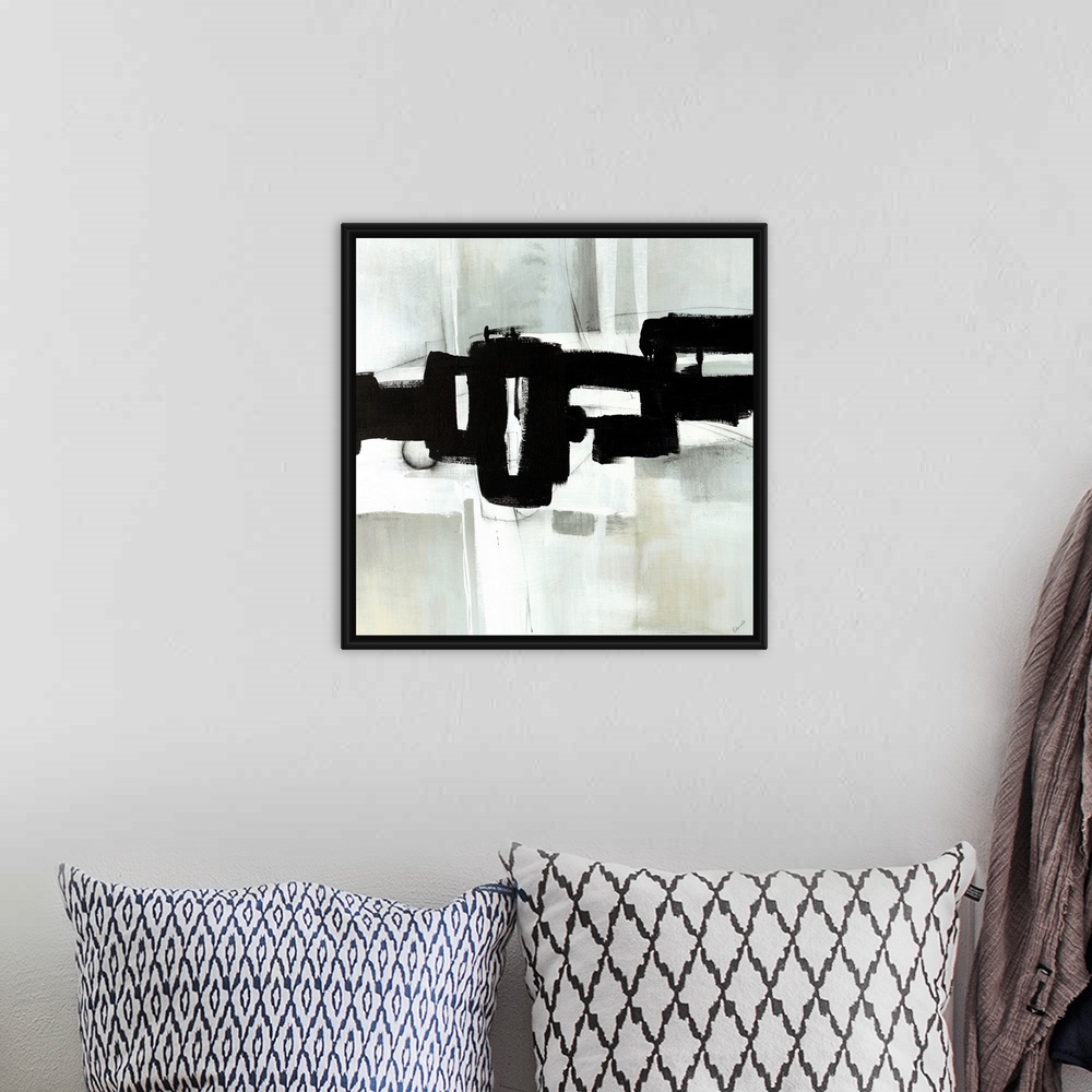 A bohemian room featuring Contemporary abstract painting of interlocking black shapes over a gray background.