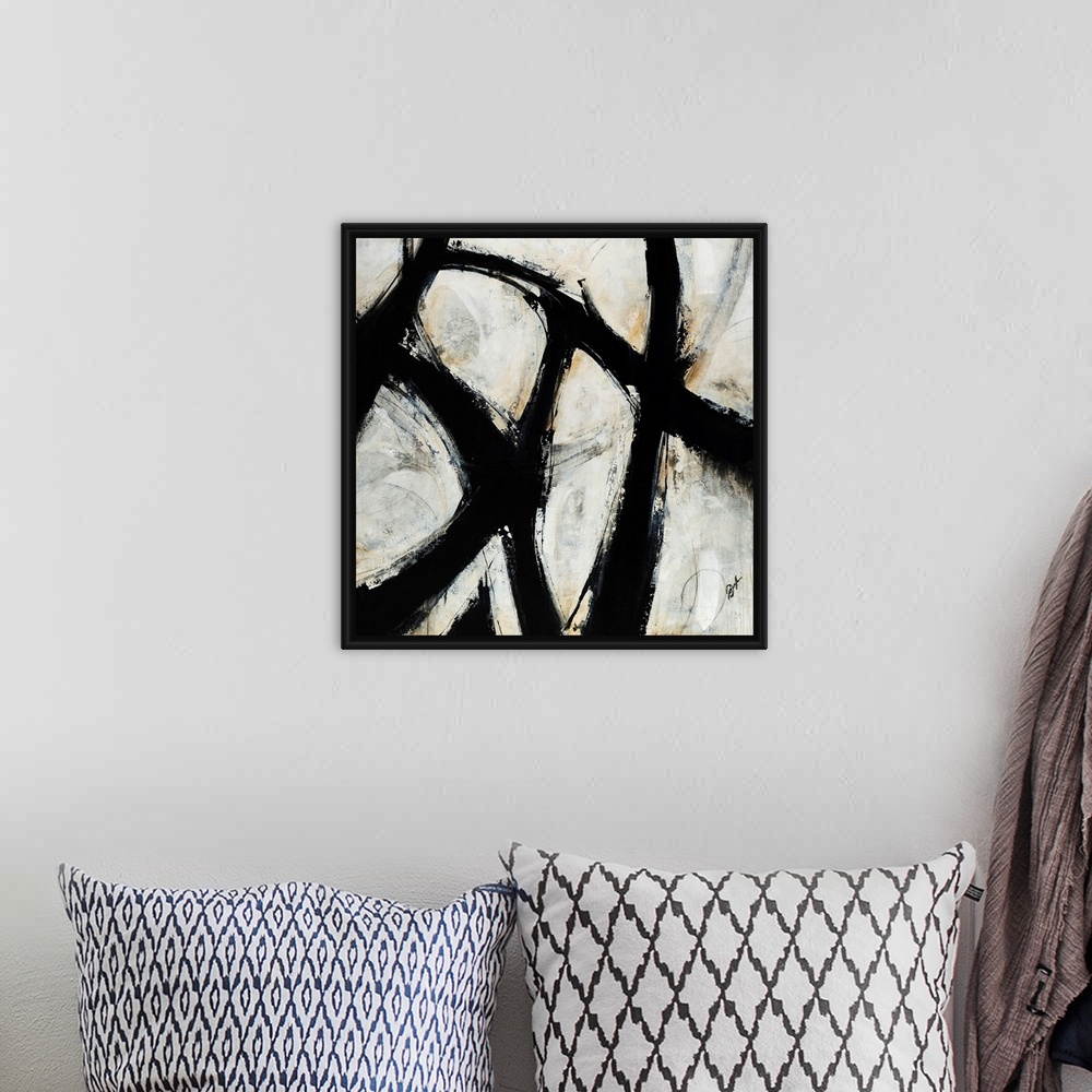A bohemian room featuring Contemporary abstract painting of black brush strokes over a netural background.