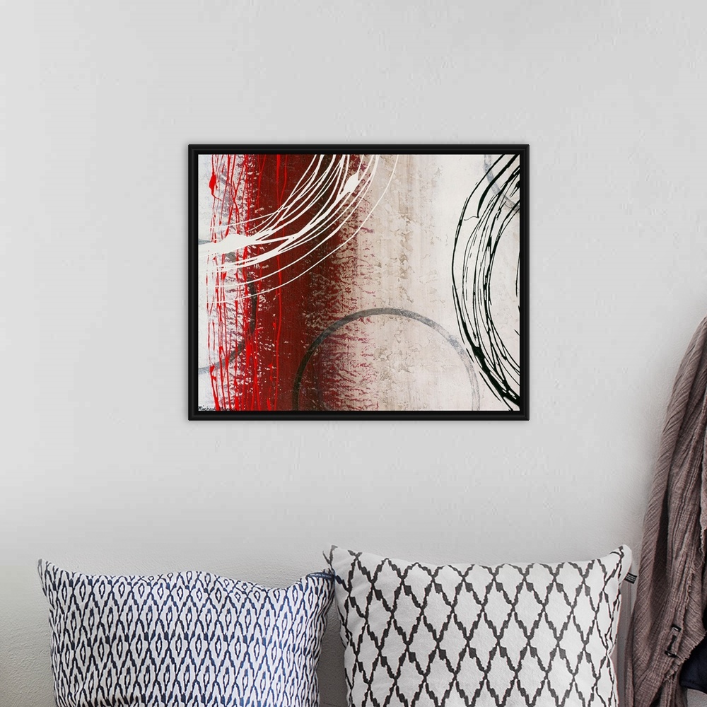 A bohemian room featuring Abstract painting of  overlapping circles and lines.  The background has distressed vertical band...