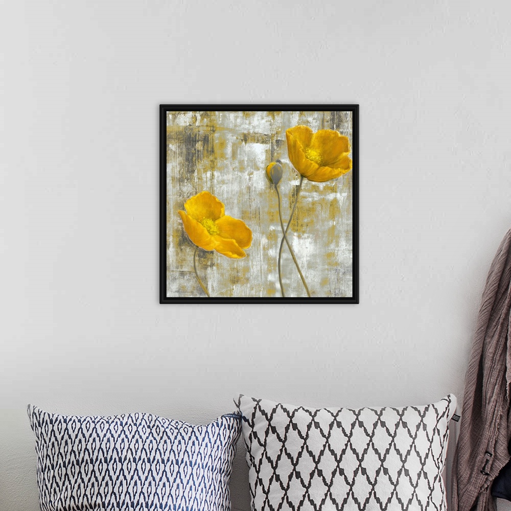 A bohemian room featuring Contemporary artwork of two yellow flowers and a third budding flower. The background is abstract...