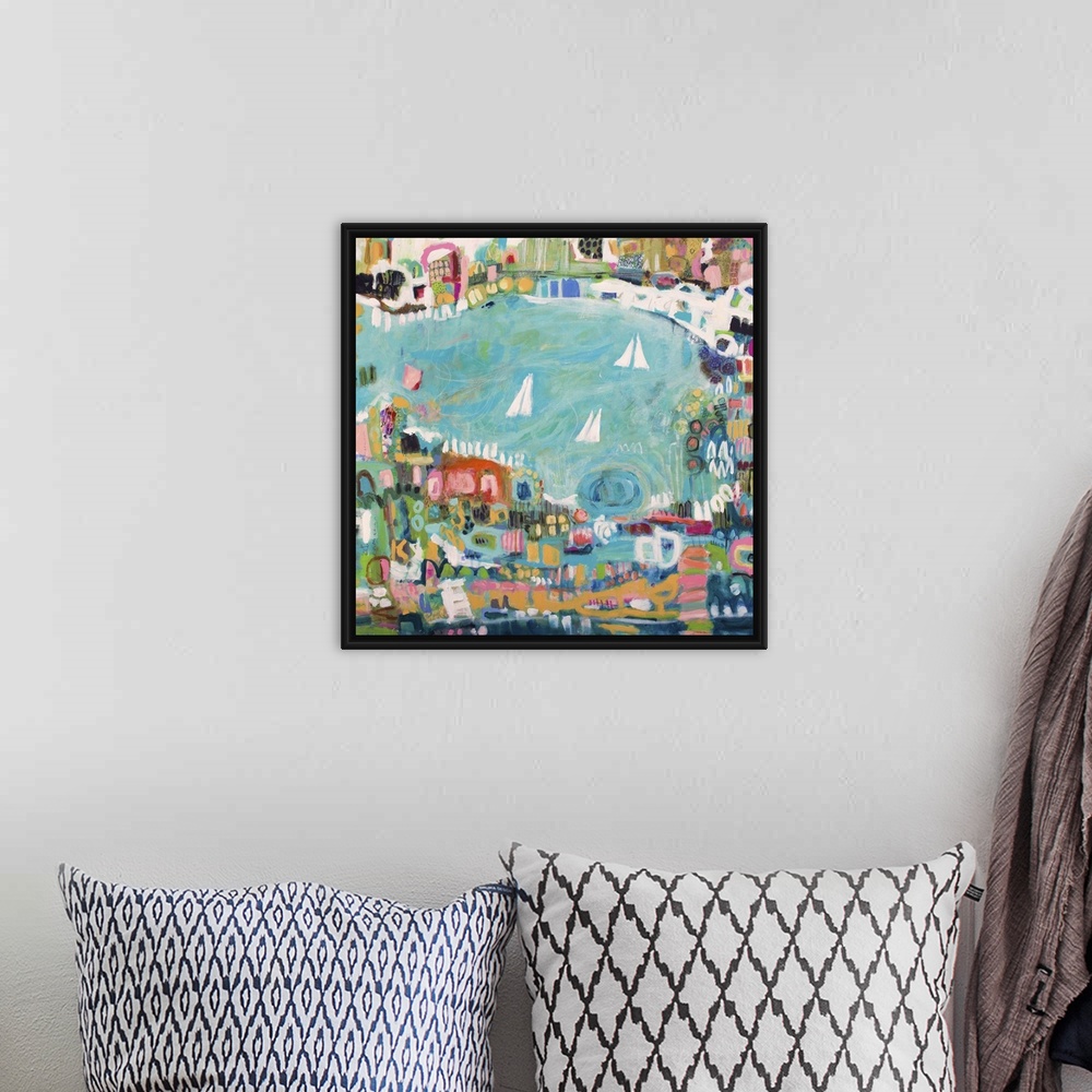 A bohemian room featuring Contemporary painting of an aerial view of a coastal town with sailboats in the bay.