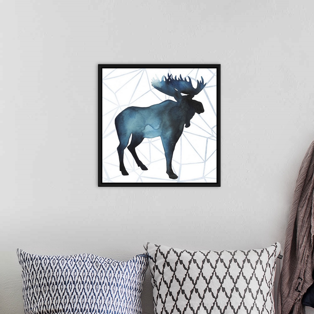 A bohemian room featuring Watercolor moose silhouette on a grey geometric background.