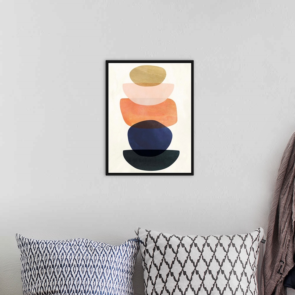A bohemian room featuring Mid-century modern style abstract painting with multi-colored overlapping shapes.