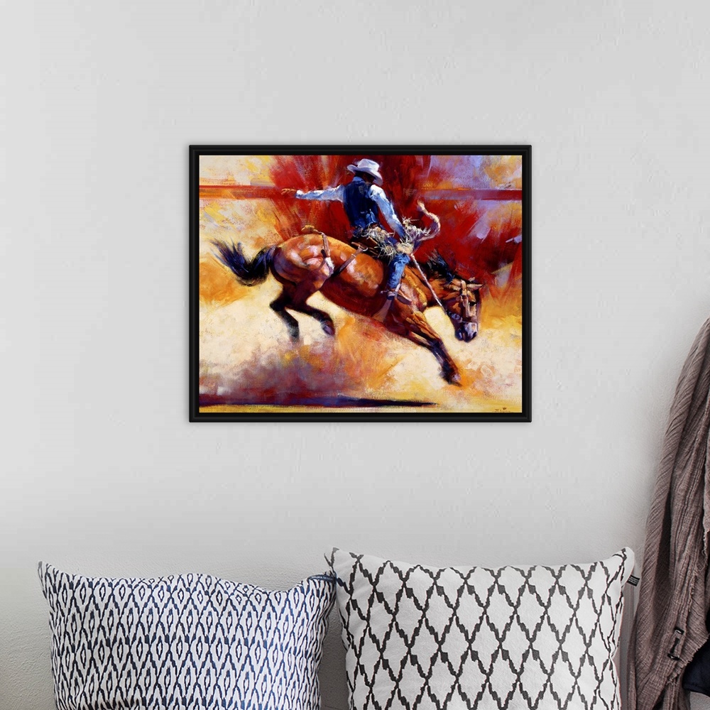 A bohemian room featuring Contemporary painting of a cowboy riding a horse that is in mid action throwing up dust on canvas.