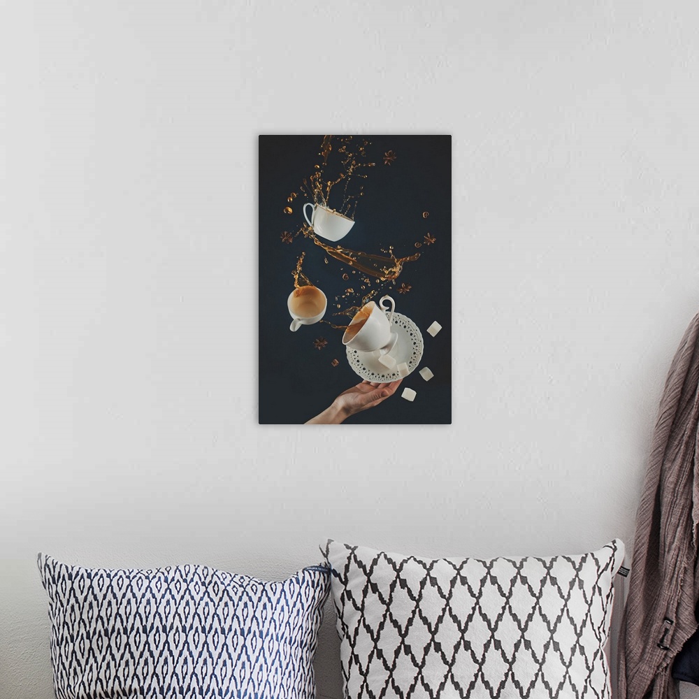 A bohemian room featuring Flying coffee cups with saucer, dynamic splashes and falling sugar cubes on a black background. D...