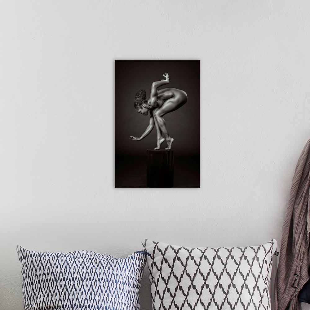 A bohemian room featuring Black and white fine art photograph of an African American woman balancing and posing on a pedest...