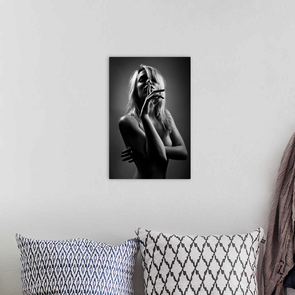 A bohemian room featuring Portrait of a beautiful woman holding a finger up to her mouth in silence.