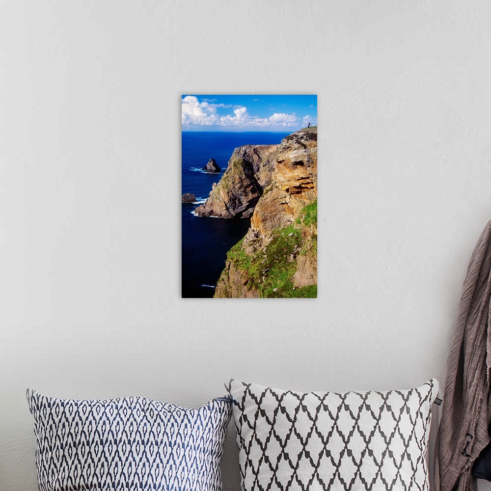 A bohemian room featuring Arranmore Island, County Donegal, Ireland; Hiker On Coastal Cliff
