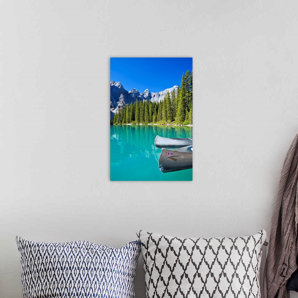 A bohemian room featuring Canoes In Moraine Lake, Banff National Park, Alberta, Canada