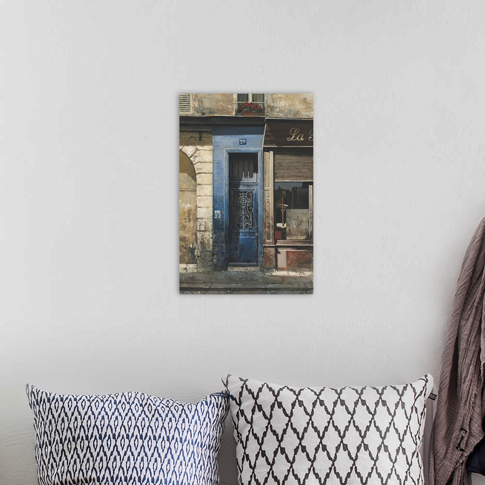 A bohemian room featuring Contemporary painting of a storefront and blue door downtown in a city.