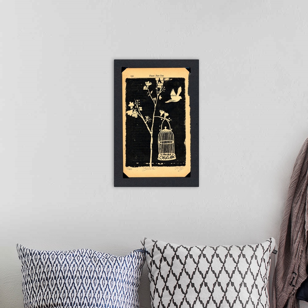 A bohemian room featuring Monotone print of a bird flying over a birdcage.