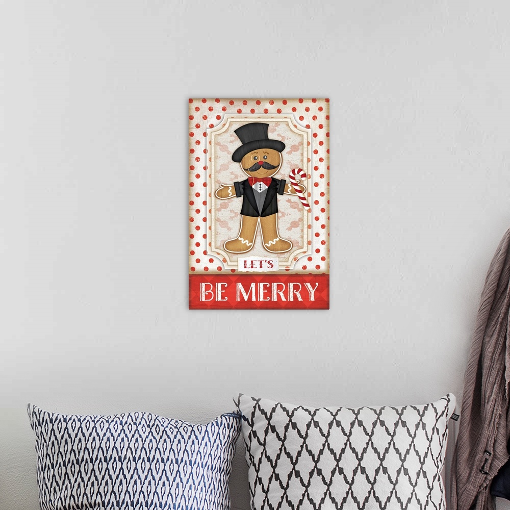A bohemian room featuring Holiday themed home decor artwork of a gingerbread man against a white and red polka dotted backg...