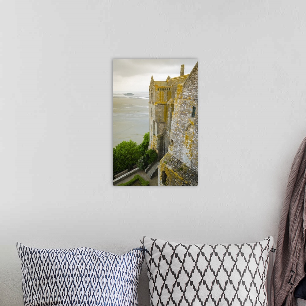 A bohemian room featuring Abbey walls and bay, Mont Saint-Michel monastery, Normandy, France.