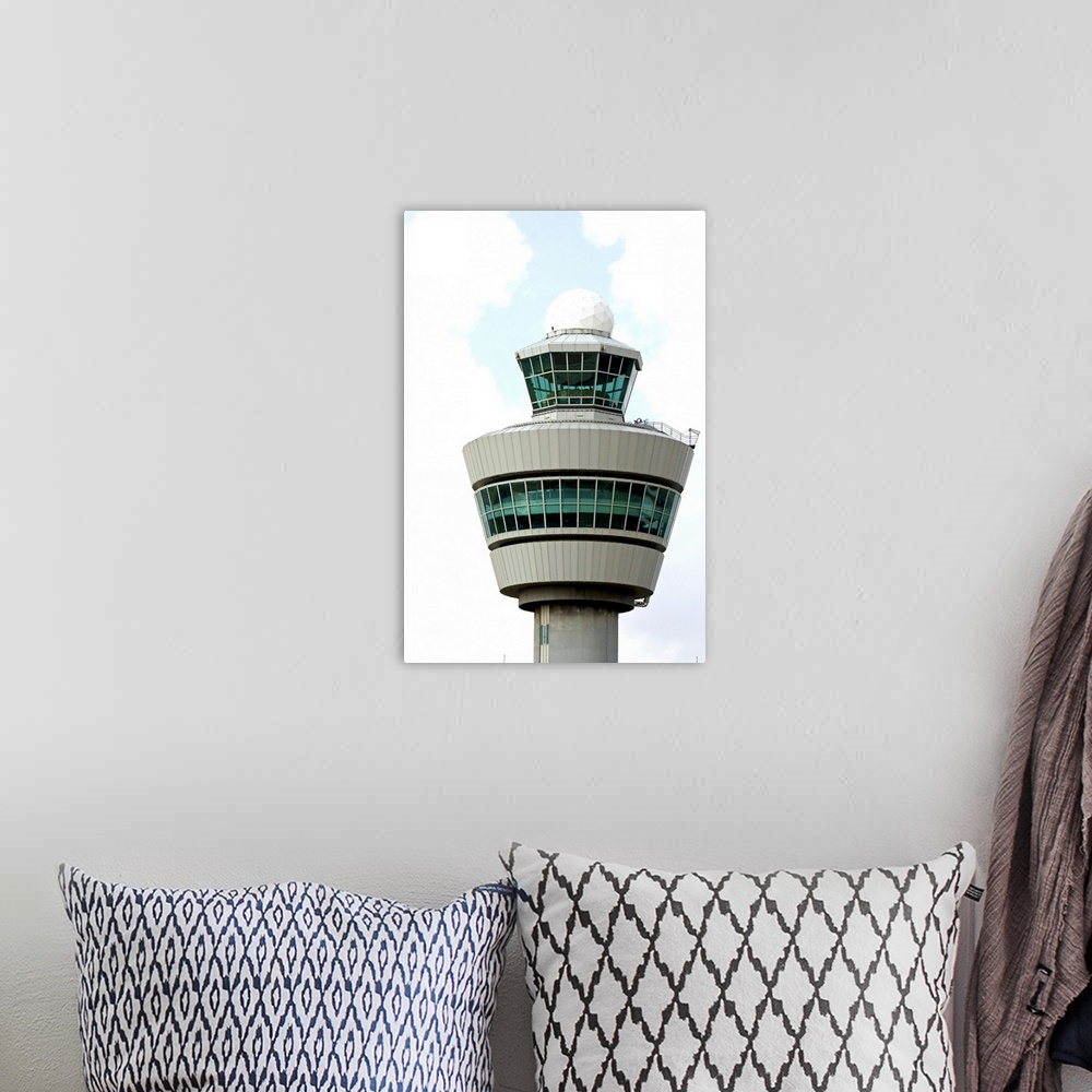 A bohemian room featuring Air traffic control tower at Schiphol Airport in Amsterdam, Netherlands.
