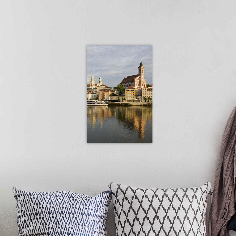 A bohemian room featuring Germany, Bayern-Bavaria, Passau. Danube River View with St. Paul church, sunset.