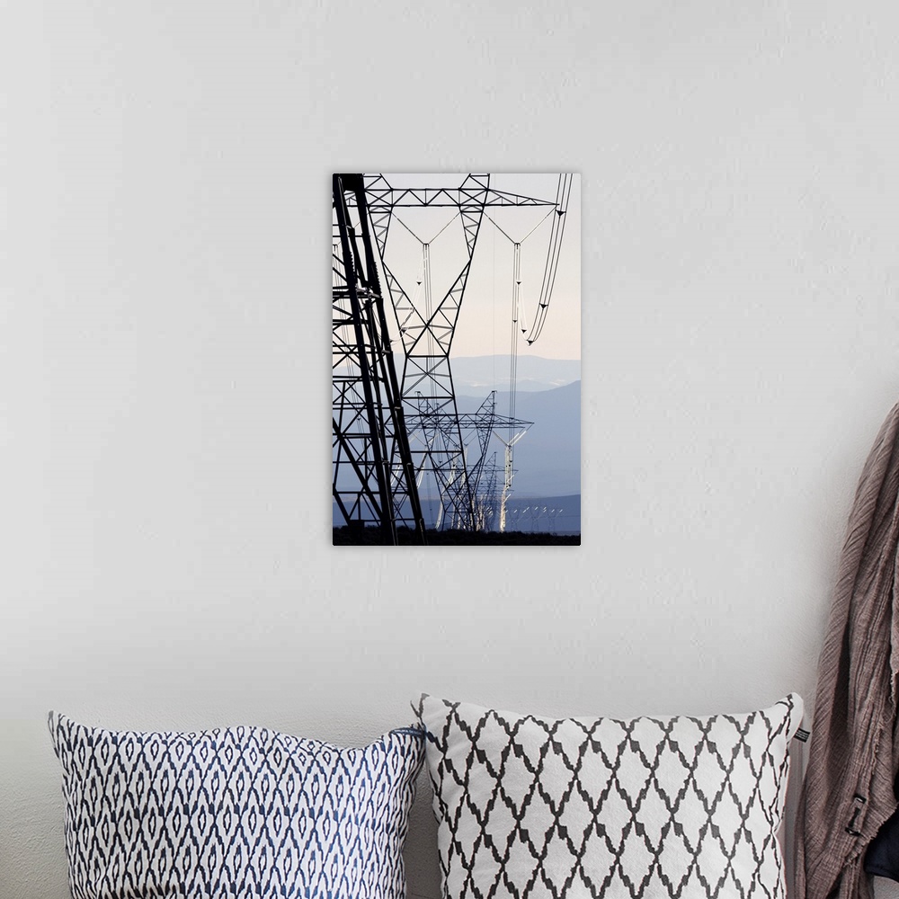A bohemian room featuring High voltage electrical transmission powerlines