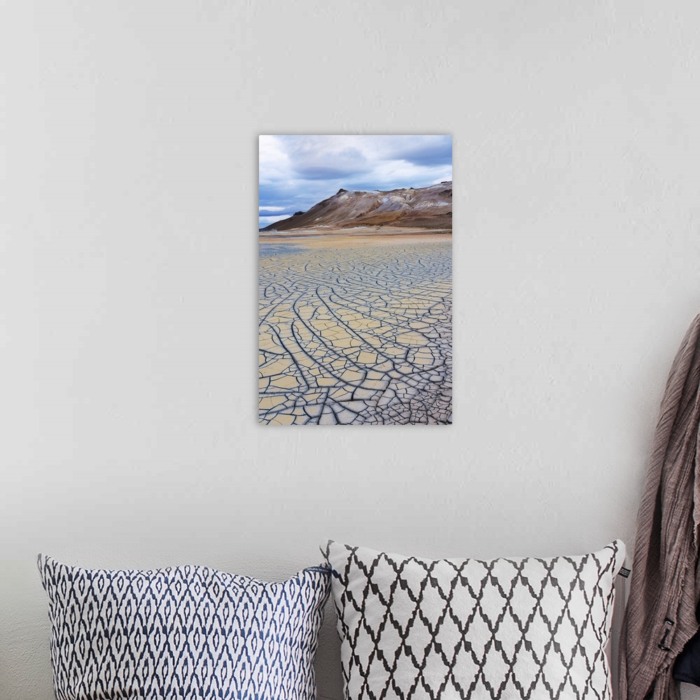 A bohemian room featuring Iceland, Lake Myvatn District, Hverir Geothermal Area, mud flats. Patterns of drying mud near the...