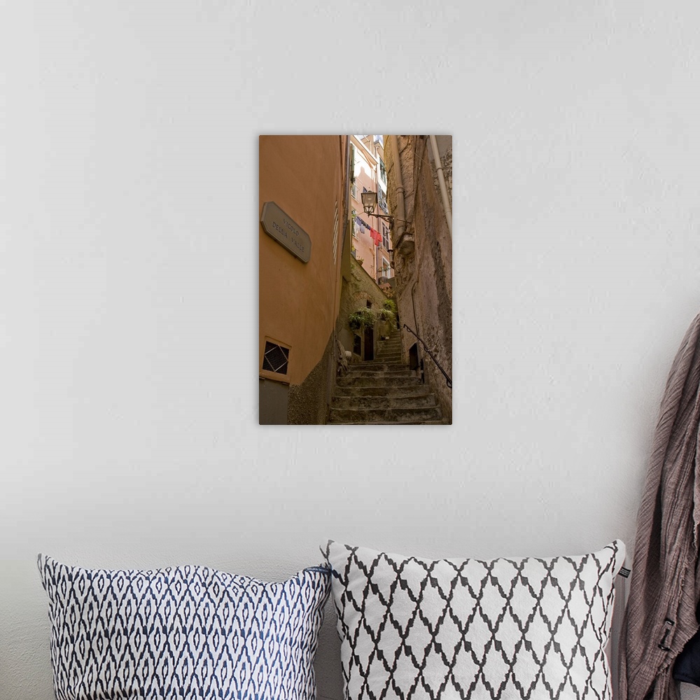 A bohemian room featuring Europe, Italy, Cinque Terre, Riomaggiore. Steep steps between buildings.