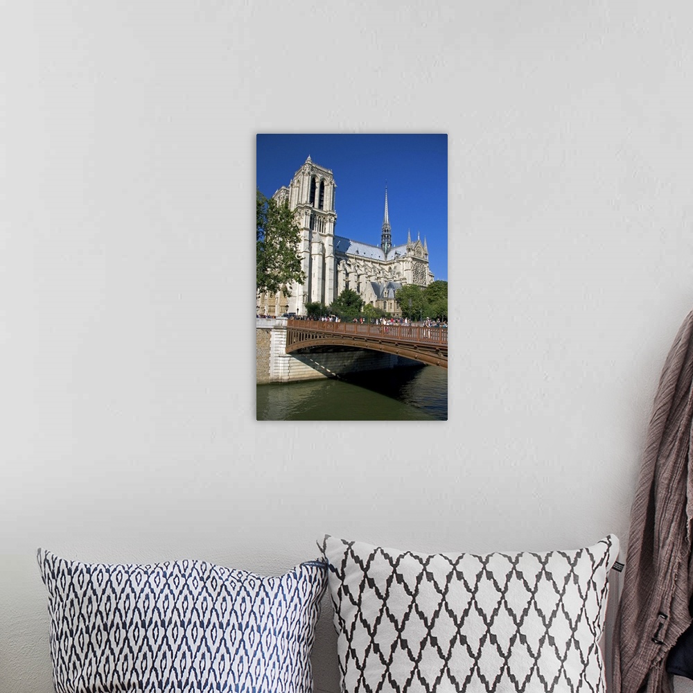 A bohemian room featuring Notre Dame cathedral along the river Seine in Paris, France.