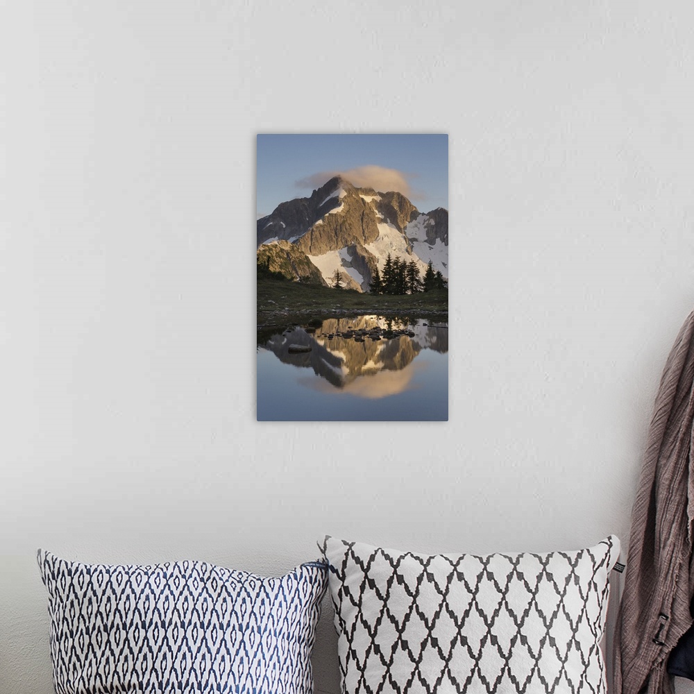 A bohemian room featuring Whatcom Peak reflected in Tapto Lake, North Cascades National Park